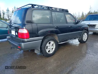 2001 Lexus LX 470 with VIN JTJHT00W613500563, listed as a IAAI auction lot 41730804 with 232,647 mi miles and . Bid and sale history available at carsss.com. Image 4.