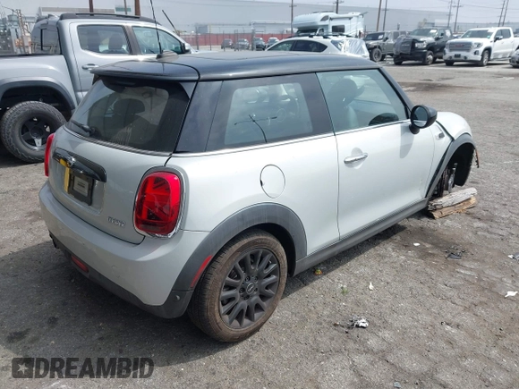 2021 MINI Hardtop Cooper with VIN WMWXR3C09M2N96671, listed as a IAAI auction lot 42031023 with 12,450 mi miles and . Bid and sale history available at DreamBid. Image 4.