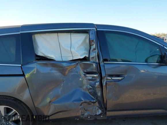 2016 Honda Odyssey Touring Elite with VIN 5FNRL5H98GB132255, listed as a IAAI auction lot 41839600 with 131,064 mi miles and . Bid and sale history available at DreamBid. Image 13.