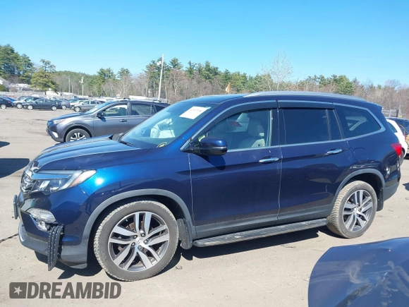 2017 Honda Pilot Touring with VIN 5FNYF6H98HB020341, listed as a IAAI auction lot 42037156 with 73,511 mi miles and . Bid and sale history available at DreamBid. Image 14.