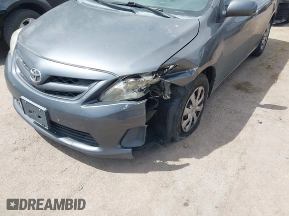 2011 Toyota Corolla L with VIN 2T1BU4EEXBC559590, listed as a IAAI auction lot 42101256 with 163,307 mi miles and . Bid and sale history available at DreamBid. Image 6.