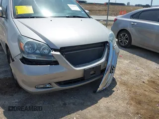 2007 Honda Odyssey EX-L with VIN 5FNRL38757B431334, listed as a IAAI auction lot 42026018 with 135,898 mi miles. Bid and sale history available at carsss.com. Image 6.