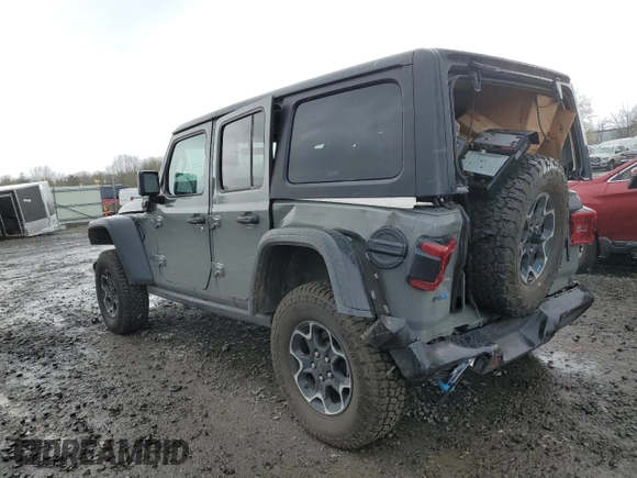 2023 Jeep Wrangler Rubicon with VIN 1C4JJXR68PW696504, listed as a Copart auction lot 50996915 with 44,947 mi miles and Salvage title. Bid and sale history available at DreamBid. Image 2.