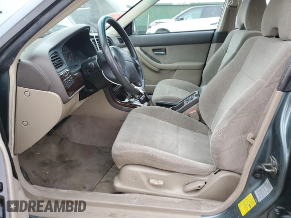 2001 Subaru Legacy Outback with VIN 4S3BH675317610103, listed as a Copart auction lot 82329804 with 199,445 mi miles and Salvage title. Bid and sale history available at DreamBid. Image 7.