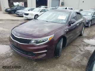 2016 Kia Optima LX with VIN 5XXGT4L3XGG027430, listed as a IAAI auction lot 41940146 with 75,456 mi miles. Bid and sale history available at carsss.com. Image 2.