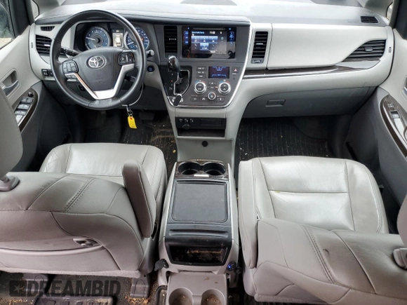 2017 Toyota Sienna XLE with VIN 5TDDZ3DC4HS187233, listed as a Copart auction lot 60227715 with 123,191 mi miles and Salvage title. Bid and sale history available at DreamBid. Image 8.