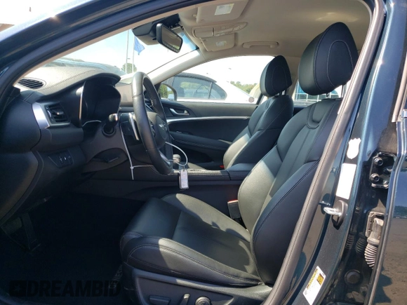 2023 Genesis G70 2.0T with VIN KMTG34TA6PU131696, listed as a Copart auction lot 69596114 with 29,968 mi miles and Salvage Title. Bid and sale history available at DreamBid. Image 7.