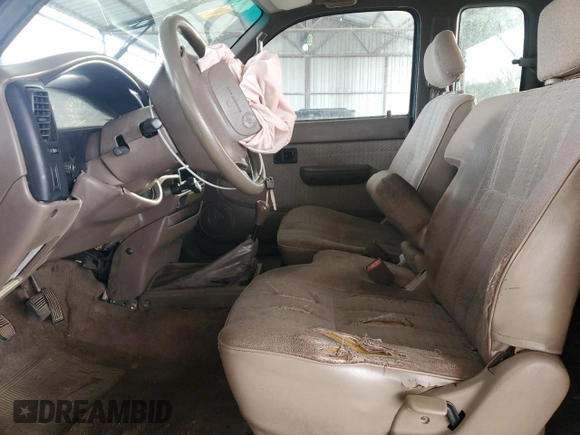 1996 Toyota Tacoma with VIN 4TAWM72N4TZ103661, listed as a Copart auction lot 86506054 with 197,518 mi miles and Salvage title. Bid and sale history available at DreamBid. Image 7.
