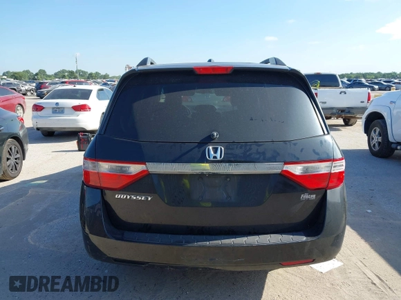 2012 Honda Odyssey EX-L z VIN 5FNRL5H63CB046447, wystawiony jako IAAI lot #42578775 z przebiegiem 247 852 mil mil oraz . Historia ofert i sprzedaży dostępna na DreamBid. Obrazek 16.
