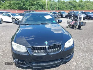 2011 BMW 3 Series 335i xDrive with VIN WBAKF9C56BE247125, listed as a IAAI auction lot 39738395 with 144,405 mi miles. Bid and sale history available at carsss.com. Image 12.