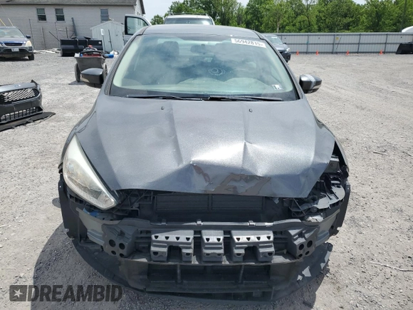 2017 Ford Focus SE with VIN 1FADP3F2XHL201380, listed as a Copart auction lot 56942815 with 136,169 mi miles and Salvage title. Bid and sale history available at DreamBid. Image 5.