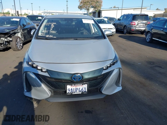 2022 Toyota Prius LE z VIN JTDKAMFP8N3211485, wystawiony jako IAAI lot #42515220 z przebiegiem 23 875 mil mil oraz . Historia ofert i sprzedaży dostępna na DreamBid. Obrazek 13.