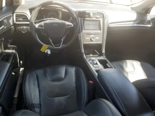 2019 Ford Fusion Titanium with VIN 3FA6P0D91KR205463, listed as a Copart auction lot 54764795 with 105,719 mi miles and Salvage title. Bid and sale history available at DreamBid. Image 8.