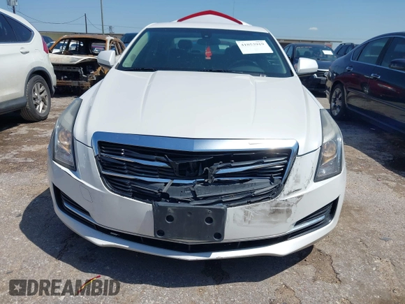 2018 Cadillac ATS RWD z VIN 1G6AA5RX8J0180654, wystawiony jako IAAI lot #41853919 z przebiegiem 80 345 mil mil oraz . Historia ofert i sprzedaży dostępna na DreamBid. Obrazek 6.