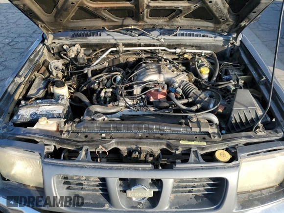2000 Nissan Frontier XE z VIN 1N6ED27Y2YC369211, wystawiony jako Copart lot #80594884 z przebiegiem 225 194 mil mil oraz Czysty tytuł • Clean title. Historia ofert i sprzedaży dostępna na DreamBid. Obrazek 11.