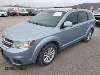 2013 Dodge Journey SXT with VIN 3C4PDDBG2DT724768, listed as a IAAI auction lot 40926457 with 150,862 mi miles and . Bid and sale history available at DreamBid. Image 2.