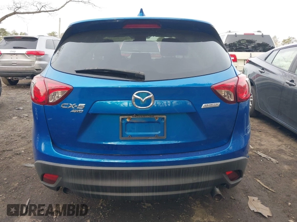 2013 Mazda CX-5 Touring with VIN JM3KE4CE0D0160711, listed as a IAAI auction lot 41843658 with 65,391 mi miles. Bid and sale history available at carsss.com. Image 16.