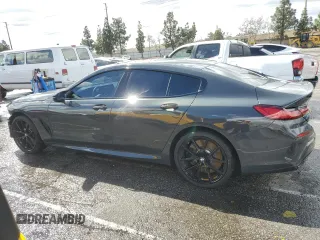2025 BMW 8 Series M850i with VIN WBAGV8C07SCT18237, listed as a Copart auction lot 49277375 with 750 mi miles and Salvage title. Bid and sale history available at DreamBid. Image 2.
