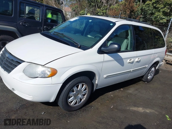 2006 Chrysler Town & Country Touring with VIN 2A8GP54L56R671585, listed as a IAAI auction lot 41475419 with 166,861 mi miles and . Bid and sale history available at DreamBid. Image 17.