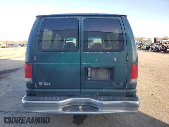 1999 Ford Econoline Passenger XL with VIN 1FMRE1126XHB41841, listed as a Copart auction lot 51338135 with 161,416 mi miles and Clean title. Bid and sale history available at DreamBid. Image 6.