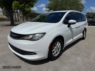 2020 Chrysler Voyager LXI with VIN 2C4RC1DG9LR144605, listed as a Copart auction lot 54107585 with 140,575 mi miles and Salvage Title. Bid and sale history available at carsss.com. Image 1.