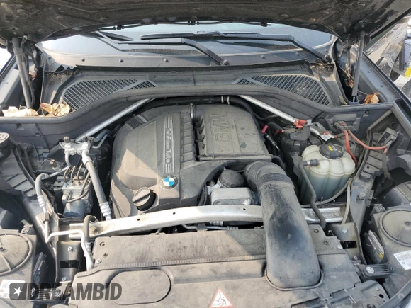2016 BMW X6 xDrive35i z VIN 5UXKU2C51G0N80206, wystawiony jako Copart lot #58943895 z przebiegiem 74 870 mil mil oraz Szkoda całkowita • Salvage title. Historia ofert i sprzedaży dostępna na DreamBid. Obrazek 12.