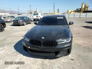 2021 BMW 5 Series 530e with VIN WBA13AG04MCF47235, listed as a Copart auction lot 69120474 with 74,779 mi miles and Salvage Title. Bid and sale history available at carsss.com. Image 11.