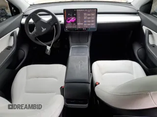 2021 Tesla Model Y Long Range with VIN 5YJYGDEE4MF231016, listed as a Copart auction lot 50908475 with 35,216 mi miles and Salvage Title. Bid and sale history available at DreamBid. Image 8.