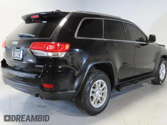 2018 Jeep Grand Cherokee Laredo E with VIN 1C4RJEAG0JC513620, listed as a Copart auction lot 63520735 with 67,654 mi miles and Clean title. Bid and sale history available at DreamBid. Image 3.