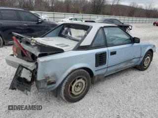 1989 Toyota MR2 z VIN JT2AW15C2K0146245, wystawiony jako Copart lot #87315874 z przebiegiem 162 741 mil mil oraz Tytuł czysty. Historia ofert i sprzedaży dostępna na DreamBid. Obrazek 3.