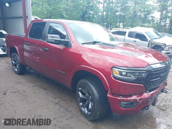 2023 Ram 1500 Limited with VIN 1C6SRFHM2PN509939, listed as a IAAI auction lot 42514018 with 31,669 mi miles and . Bid and sale history available at DreamBid. Image 1.
