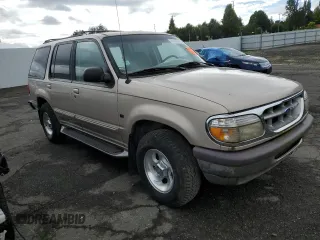 1997 Ford Explorer XLT with VIN 1FMDU35PXVZB69793, listed as a Copart auction lot 70712774 with 138,243 mi miles and Salvage title. Bid and sale history available at DreamBid. Image 4.