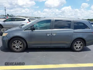 2012 Honda Odyssey EX-L с VIN 5FNRL5H69CB060174, выставлен на аукционе IAAI как лот 42335345 с пробегом 150 457 миль миль и . История ставок и продаж доступна на DreamBid. Изображение 14.