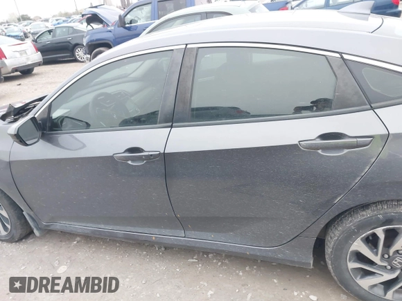2018 Honda Civic EX with VIN 2HGFC2F79JH570403, listed as a IAAI auction lot 42018123 with 165,821 mi miles and . Bid and sale history available at DreamBid. Image 14.