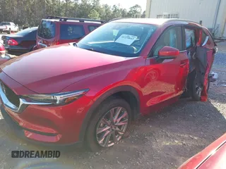 2020 Mazda CX-5 Grand Touring with VIN JM3KFADM8L0846818, listed as a IAAI auction lot 41224843 with 123,554 mi miles. Bid and sale history available at carsss.com. Image 2.