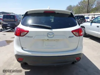 2014 Mazda CX-5 Touring with VIN JM3KE2CY2E0426164, listed as a IAAI auction lot 41812932 with 186,015 mi miles. Bid and sale history available at carsss.com. Image 17.