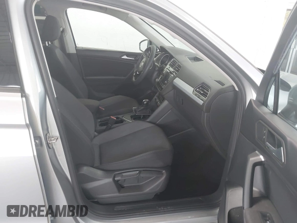 2019 Volkswagen Tiguan S with VIN 3VV1B7AX6KM189497, listed as a IAAI auction lot 42669313 with 236,719 mi miles and . Bid and sale history available at DreamBid. Image 5.