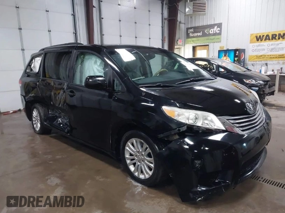 2011 Toyota Sienna XLE AAS with VIN 5TDYK3DC3BS141051, listed as a IAAI auction lot 41741058 with 236,626 mi miles. Bid and sale history available at carsss.com. Image 1.