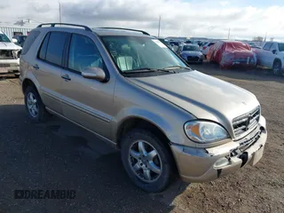 2002 Mercedes-Benz M 320/430/500 with VIN 4JGAB75E02A310556, listed as a IAAI auction lot 41685541 with 180,930 mi miles and . Bid and sale history available at carsss.com. Image 1.