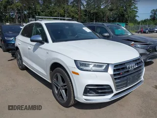 2018 Audi SQ5 Prestige z VIN WA1C4AFY4J2124874, wystawiony jako IAAI lot #42442773 z przebiegiem 86 612 mil mil oraz . Historia ofert i sprzedaży dostępna na DreamBid. Obrazek 1.