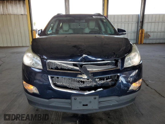 2012 Chevrolet Traverse LTZ z VIN 1GNKRLED9CJ332651, wystawiony jako Copart lot #55253655 z przebiegiem 128 113 mil mil oraz Szkoda całkowita • Salvage title. Historia ofert i sprzedaży dostępna na DreamBid. Obrazek 5.