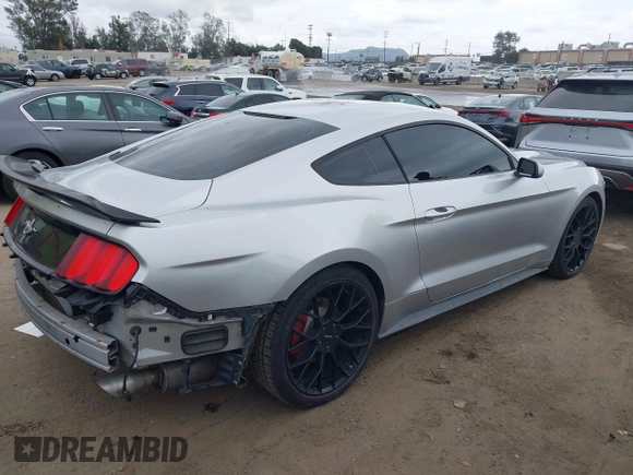 2015 Ford Mustang V6 with VIN 1FA6P8AM2F5370342, listed as a IAAI auction lot 42065605 with 141,569 mi miles and . Bid and sale history available at DreamBid. Image 4.