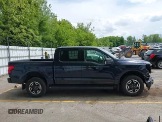 2023 Ford F-150 Lightning Pro with VIN 1FTVW1EL6PWG30061, listed as a IAAI auction lot 42362295 with 22,481 mi miles and . Bid and sale history available at DreamBid. Image 13.