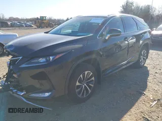 2022 Lexus RX with VIN JTJHZKFA7N2037057, listed as a IAAI auction lot 41804899 with 157,549 mi miles. Bid and sale history available at carsss.com. Image 2.