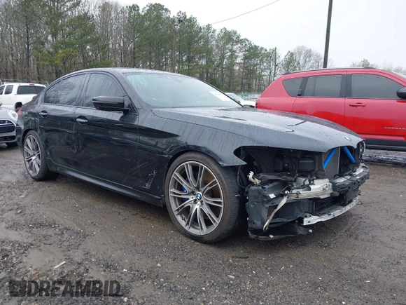 2018 BMW 5 Series M550i xDrive with VIN WBAJB9C59JB049114, listed as a IAAI auction lot 41543633 with 87,942 mi miles and . Bid and sale history available at carsss.com. Image 6.