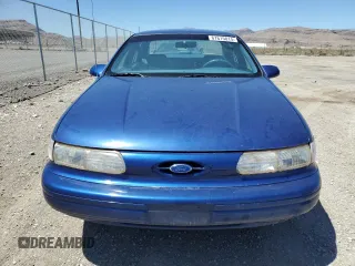 1994 Ford Taurus GL z VIN 1FALP5246RG126184, wystawiony jako Copart lot #67615014 z przebiegiem 95 189 mil mil oraz Szkoda całkowita • Salvage title. Historia ofert i sprzedaży dostępna na DreamBid. Obrazek 5.