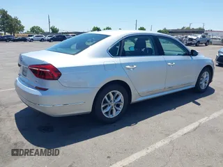 2017 Volkswagen Passat S with VIN 1VWAT7A32HC009657, listed as a IAAI auction lot 42541472 with 100,026 mi miles and . Bid and sale history available at DreamBid. Image 4.