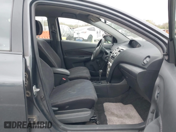 2008 Toyota Yaris with VIN JTDBT923X81192965, listed as a IAAI auction lot 42085679 with 291,057 mi miles. Bid and sale history available at carsss.com. Image 5.