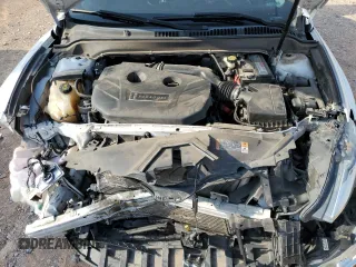 2014 Lincoln MKZ z VIN 3LN6L2G90ER820731, wystawiony jako Copart lot #57818185 z przebiegiem 133 133 mil mil oraz Szkoda całkowita • Salvage title. Historia ofert i sprzedaży dostępna na DreamBid. Obrazek 11.