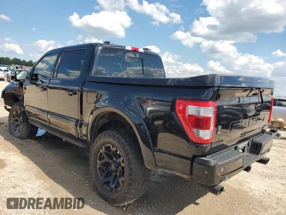 2021 Ford F-150 XL with VIN 1FTFW1E5XMFB70288, listed as a Copart auction lot 52735033 with 35,111 mi miles and Salvage Title. Bid and sale history available at carsss.com. Image 2.